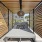 Shaded pergola with a grey day bed 